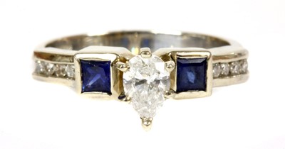 Lot 200 - A white gold diamond and sapphire ring
