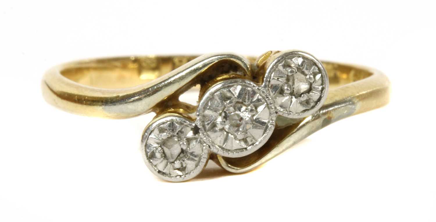 Lot 63 - A gold three stone diamond ring, c.1925