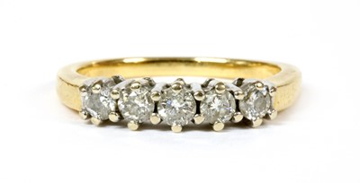 Lot 172 - An 18ct gold five stone diamond ring