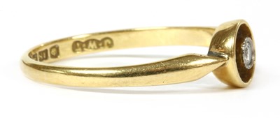 Lot 64 - An 18ct gold single stone diamond ring, c.1920