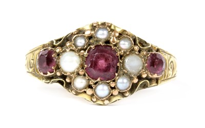 Lot 8 - A Victorian 15ct gold garnet and split pearl cluster ring