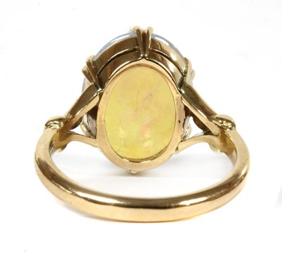 Lot 272 - A gold single stone opal ring