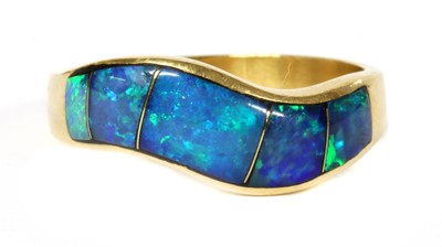 Lot 273 - A gold opal doublet ring