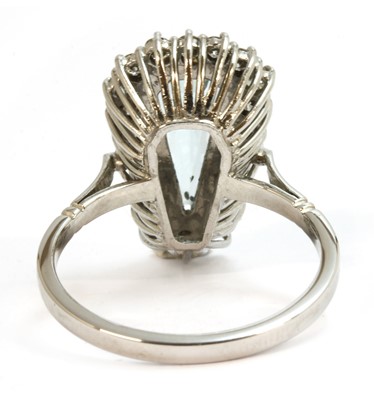 Lot 131 - A white gold aquamarine and diamond cluster ring