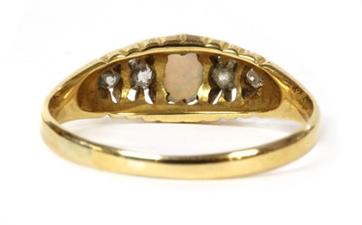 Lot 10 - An 18ct gold five stone opal and diamond ring