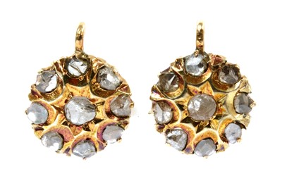 Lot 214 - A pair of gold diamond cluster earrings