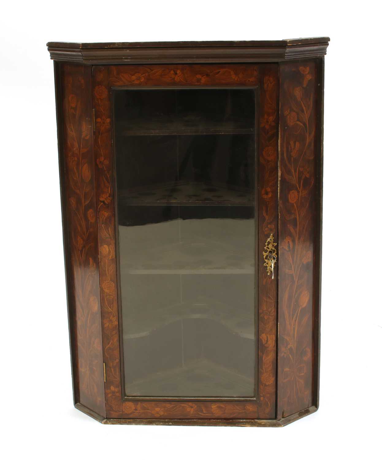 Lot 298 - A 19th century inlaid corner cabinet