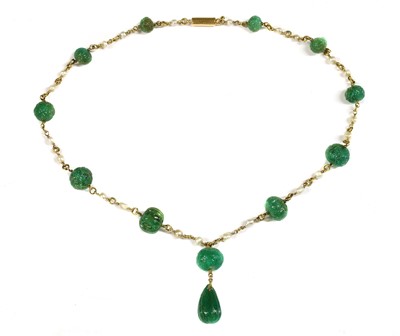 Lot 121 - A late Victorian carved emerald and pearl necklace