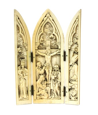 Lot 381 - A carved ivory triptych