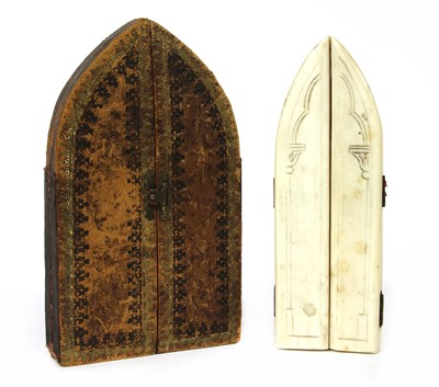 Lot 381 - A carved ivory triptych