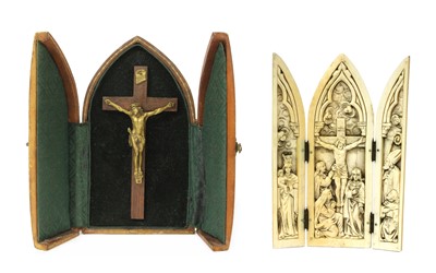 Lot 381 - A carved ivory triptych
