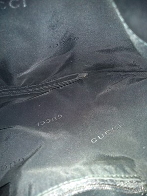 Lot 30 - A Gucci black leather shoulder bag