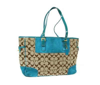 Lot 76 - A Coach teal suede and monogrammed canvas tote bag