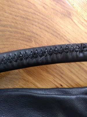 Lot 51 - A Prada black leather hobo slouch bag