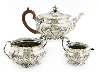 Lot 43 - A George III silver three-piece tea service