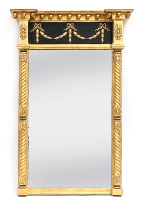 Lot 920 - A Regency giltwood and ebonised pier mirror