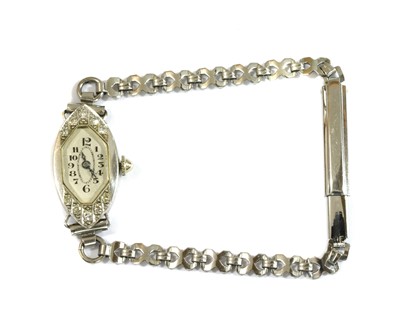 Lot 433 - An Art Deco ladies' white gold diamond set cocktail watch