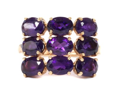 Lot 393 - A 9ct rose gold amethyst ring