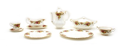 Lot 100 - A comprehensive Royal Albert Country Rose dinner tea and coffee service