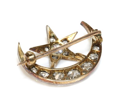 Lot 61 - A late Victorian diamond set crescent and star brooch