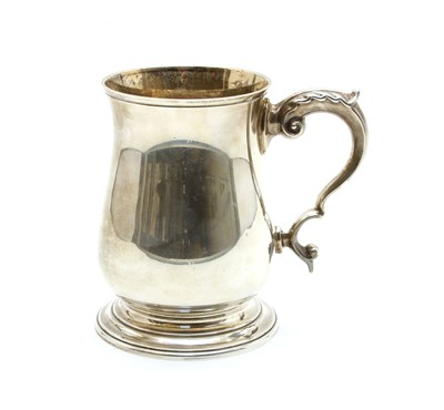 Lot 47 - A silver tankard of folded baluster form