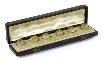 Lot 304 - A cased set of gold mounted chalcedony buttons