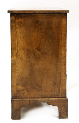 Lot 373 - A George II-style walnut chest of drawers