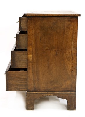 Lot 373 - A George II-style walnut chest of drawers