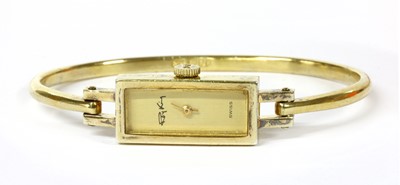 Lot 269 - A silver gilt Roy King mechanical bangle watch