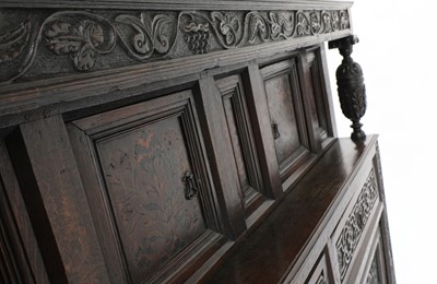 Lot 255 - A carved oak buffet cupboard
