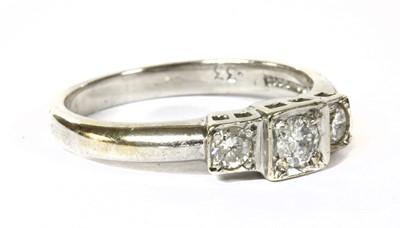 Lot 95 - A 9ct white gold three stone diamond ring
