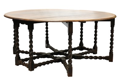 Lot 358 - A ten-seat, 17th-century-style, oak double gateleg table