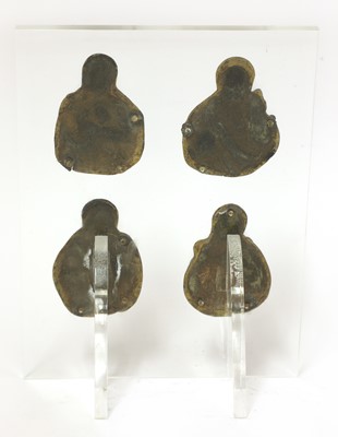 Lot 353 - A set of four bronze reliquary mounts