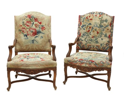 Lot 947 - A pair of Louis XV-style beechwood elbow chairs