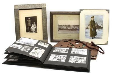 Lot 1 - A quantity of framed WWI photographs of soldiers and fretwork search light scene