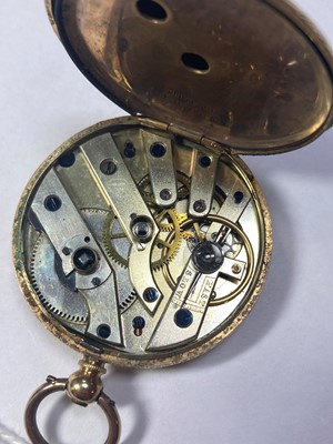 Lot 252 - A gold key wound open-faced fob watch