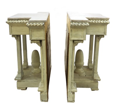 Lot 437 - A pair of painted wood breakfront console tables