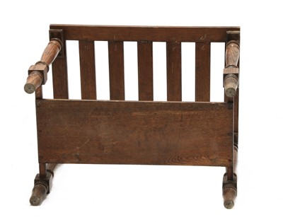 Lot 79 - A country oak luggage stand