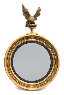 Lot 127 - A Regency-style giltwood convex mirror
