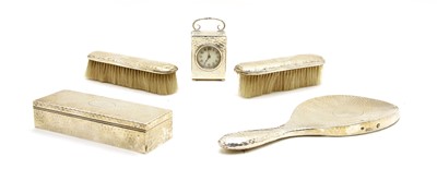Lot 43 - A hammered silver dressing table set