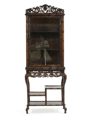 Lot 735 - A Chinese hardwood display cabinet