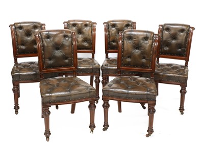 Lot 933 - A set of six Victorian walnut and buttoned leather upholstered dining chairs