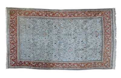 Lot 865 - A large Persian carpet