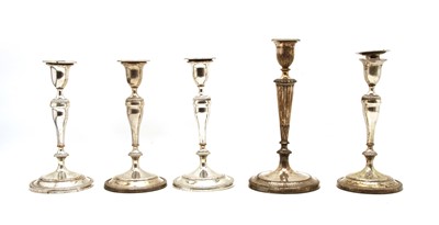 Lot 8 - A set of four silver plated candlesticks