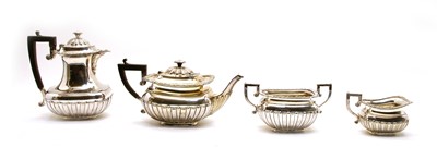 Lot 37 - A silver plated four piece tea service