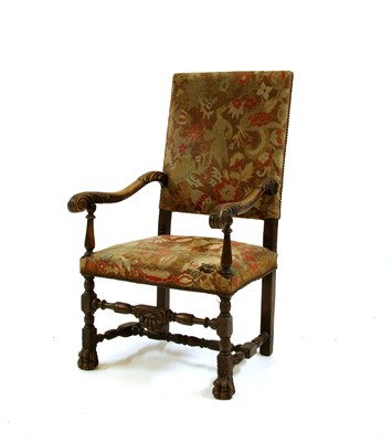 Lot 285 - A Continental carved walnut throne chair
