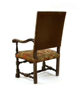 Lot 285 - A Continental carved walnut throne chair