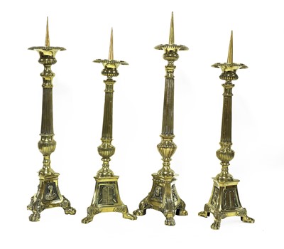 Lot 134 - Four French pricket candlesticks