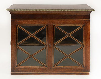 Lot 214 - A George III strung mahogany cabinet