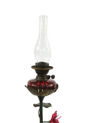 Lot 217 - A French wrought and painted brass standard oil lamp